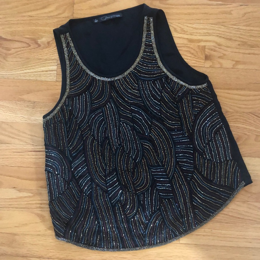 Beautiful beaded top. Pet free. Smoke free.
